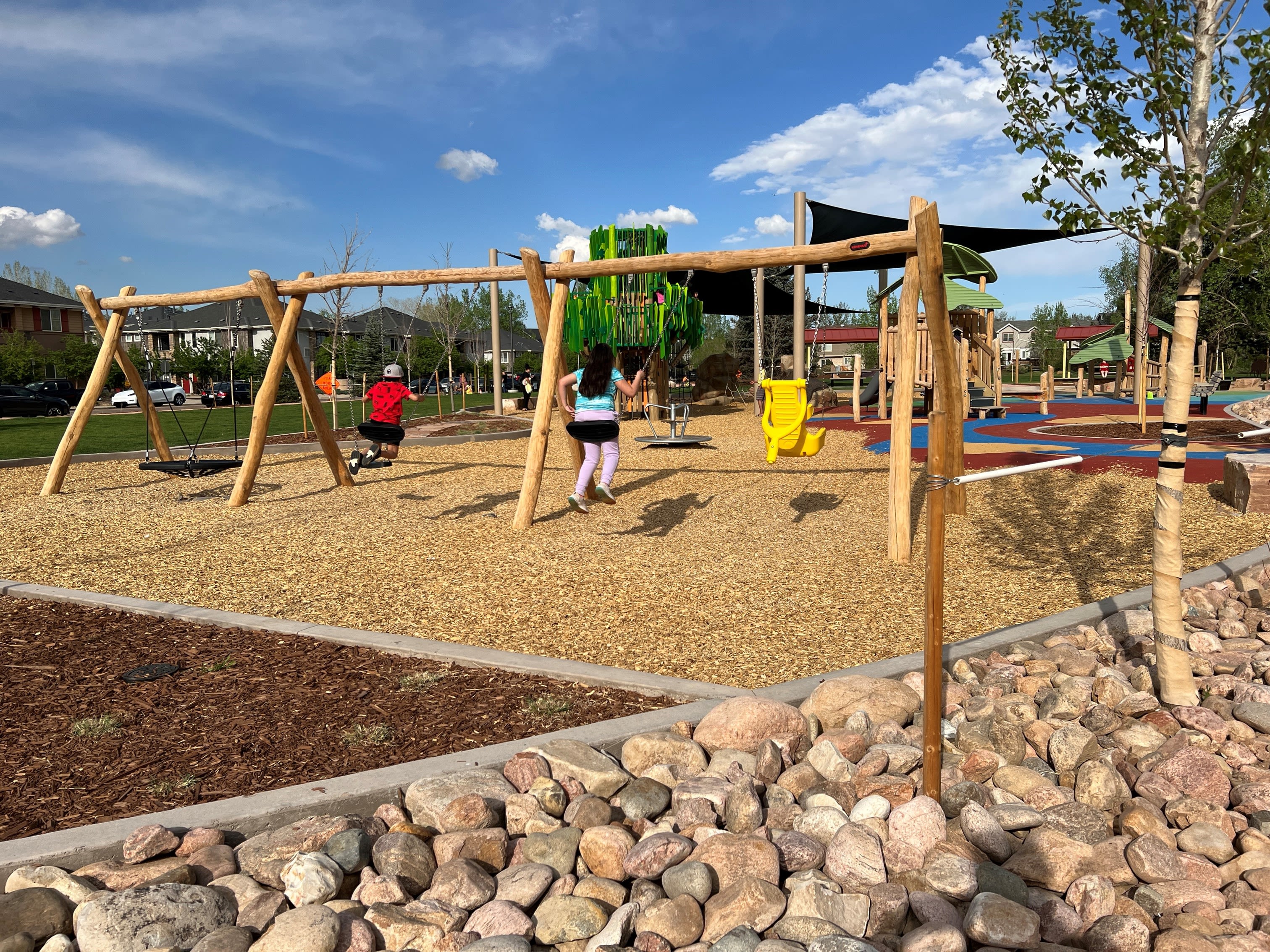 image of chlidren on a swing set
