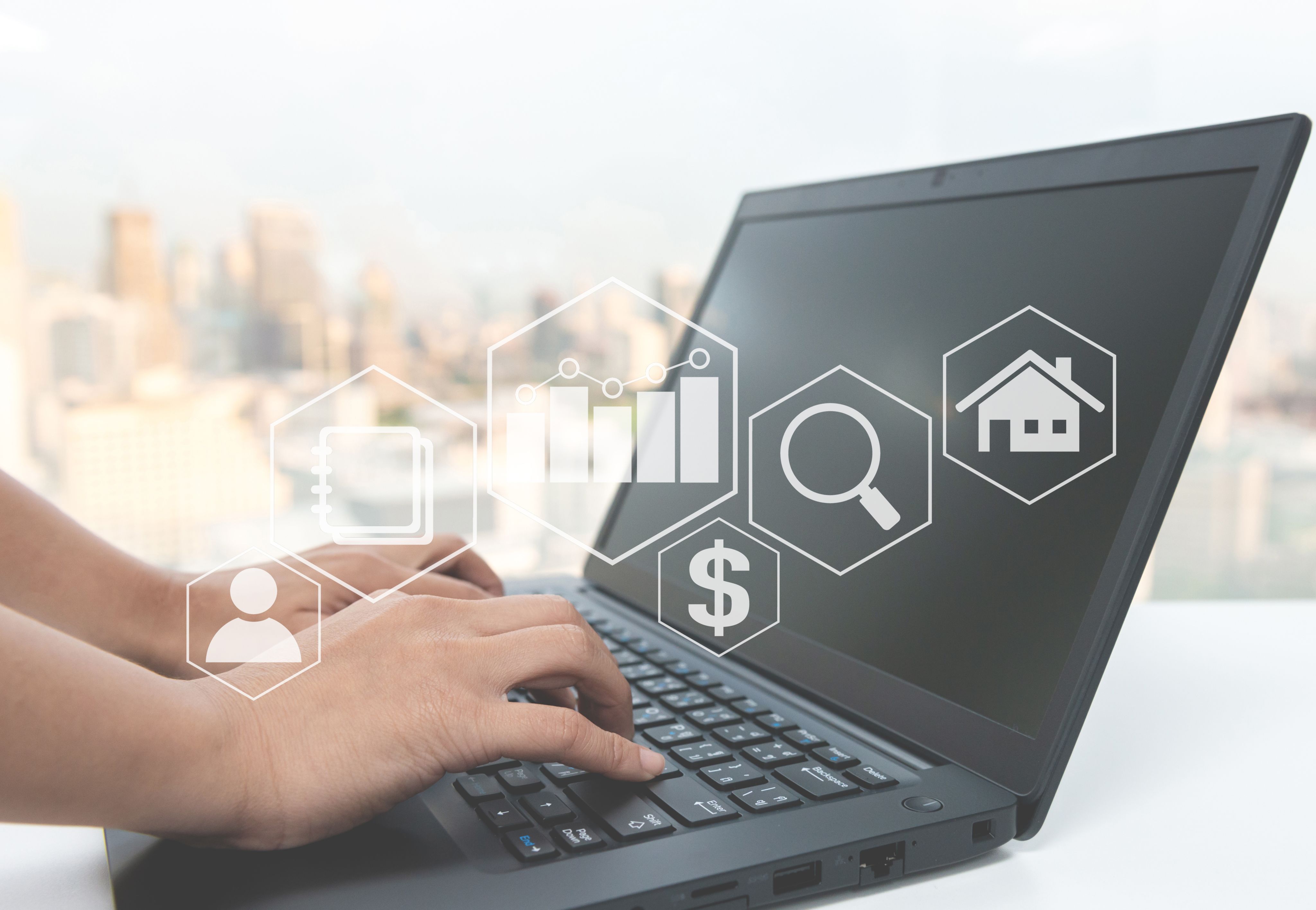 image of someone typing on a laptop