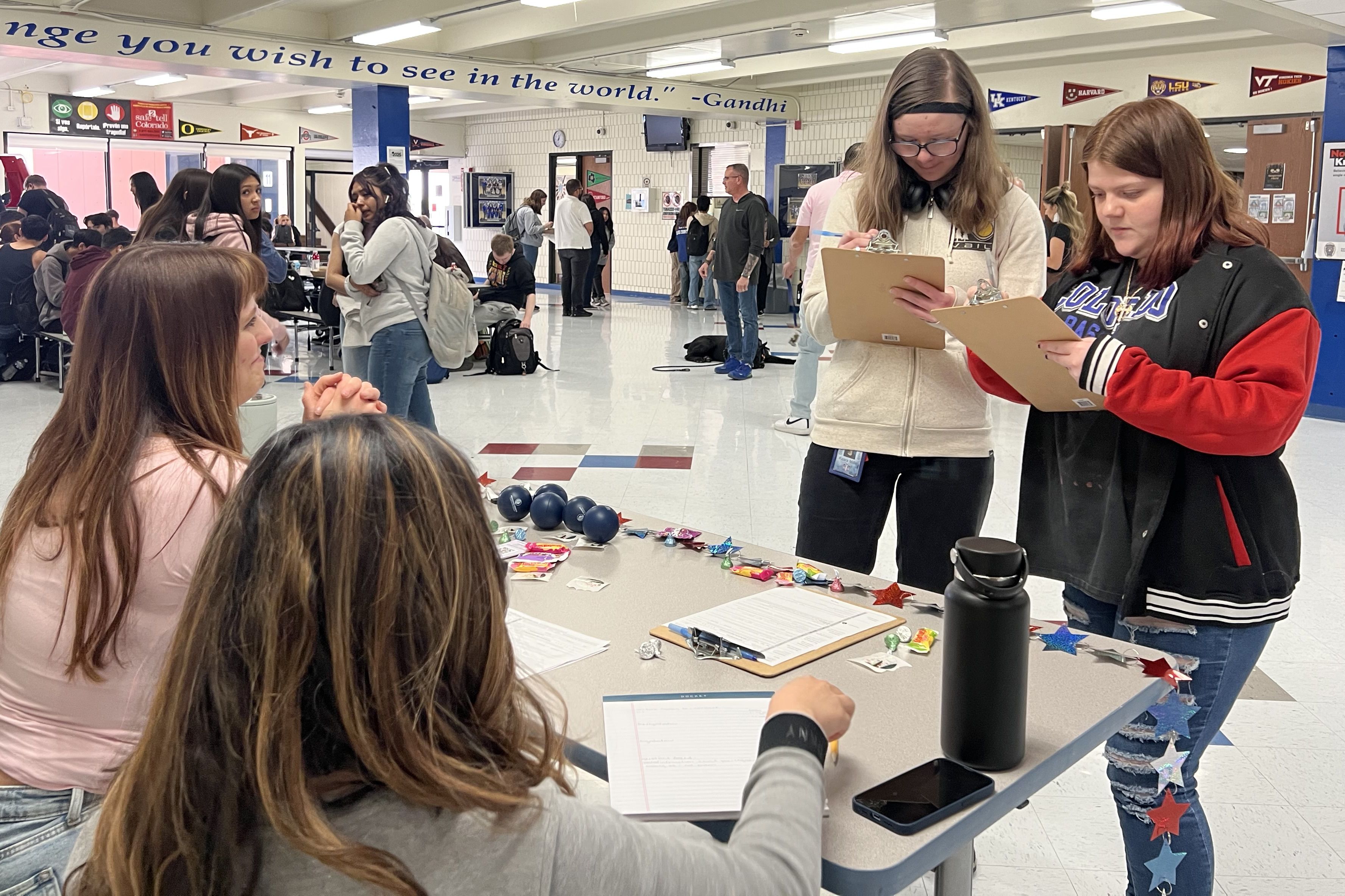 image of highschoolers getting registered to vote